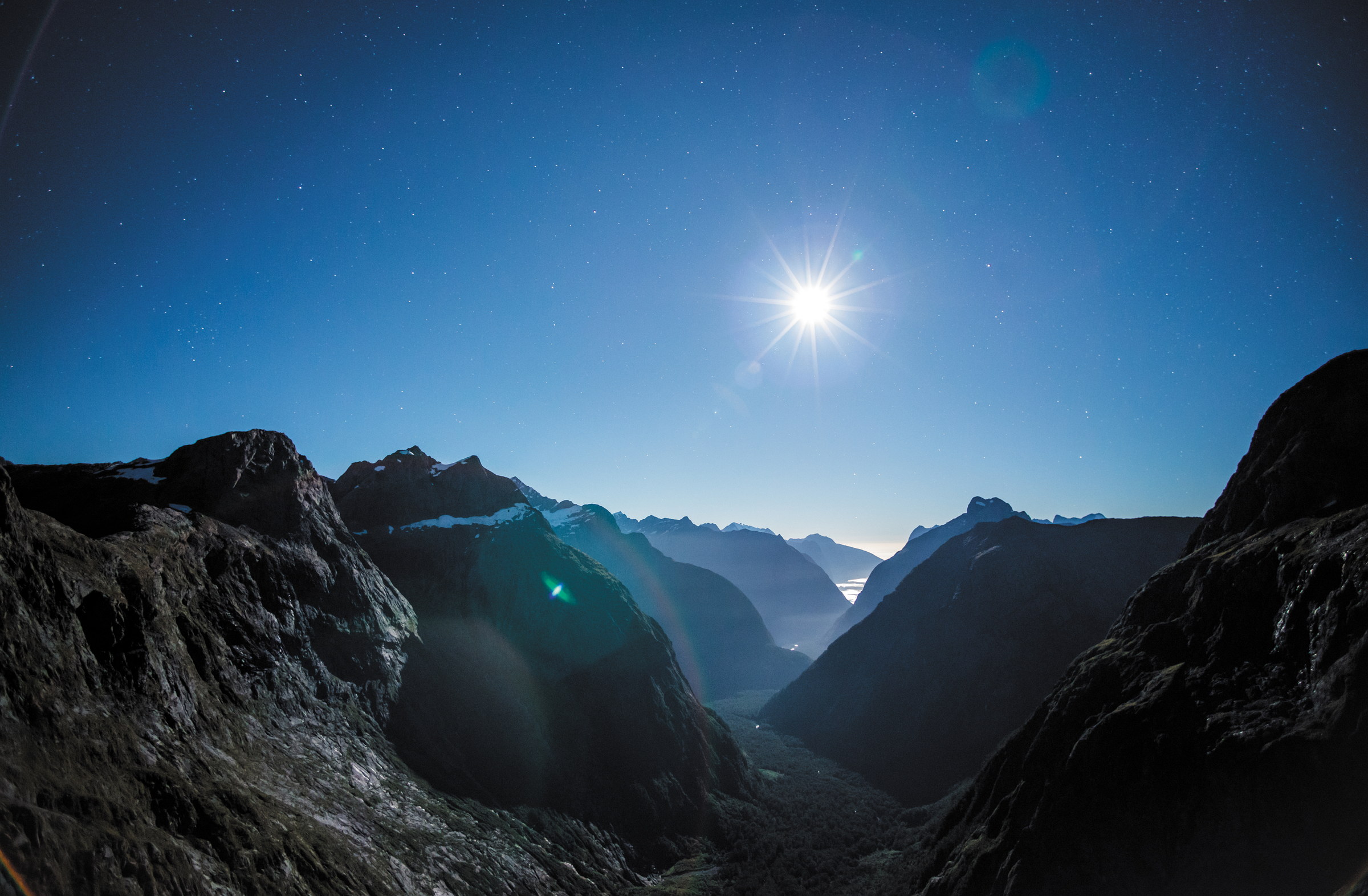 Ki Piopiotahi — Gertrude Saddle · to catch the sun, 2013 · dual screen, night